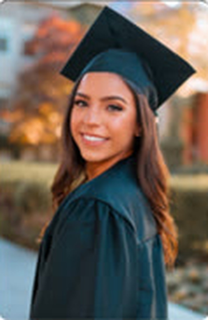 Elizabeth, the younger persona: a graduate in cap and gown